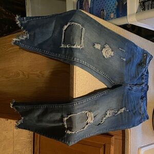 Edgy Distressed Skinny Jeans in Blue